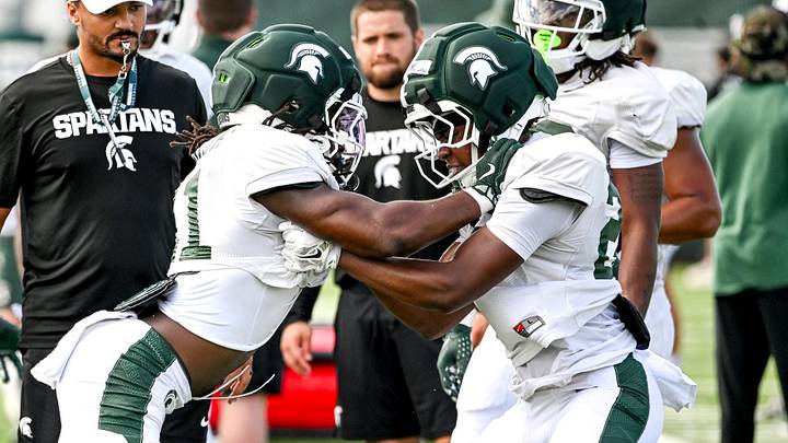 Michigan State running backs Marvis Parrish, left, and Cedric Williams Jr. work out during a drill at football practice on Monday, Aug. 17, 2026, in East Lansing. Michigan State running backs Marvis Parrish, left, and Cedric Williams Jr. work out during a drill at football practice on Monday, Aug. 17, 2026, in East Lansing.