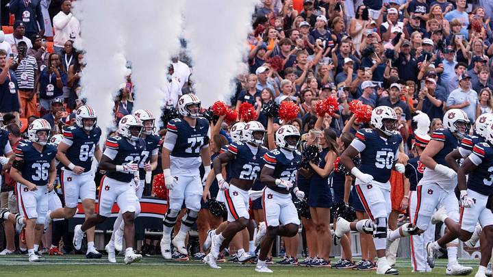 Auburn Tigers players take the field as Auburn Tigers take on Florida Gators at Jordan-Hare Stadium in Auburn, Ala. on Saturday, Sept. 19, 2026. Florida Gators lead Auburn Tigers 20-17 at halftime.