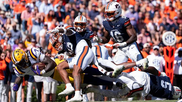 LSU Tigers tight end Trey'Dez Green (7) dives in the end zone for a touchdown after a catch as Auburn Tigers take on LSU Tigers at Jordan-Hare Stadium in Auburn, Ala. on Saturday, Oct. 24, 2026. LSU Tigers lead Auburn Tigers 31-10 at halftime. LSU Tigers tight end Trey'Dez Green (7) dives in the end zone for a touchdown after a catch as Auburn Tigers take on LSU Tigers at Jordan-Hare Stadium in Auburn, Ala. on Saturday, Oct. 24, 2026. LSU Tigers lead Auburn Tigers 31-10 at halftime.