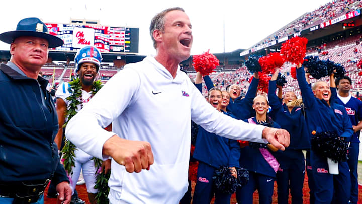 Oct 25, 2025; Norman, Oklahoma, USA;  Ole Miss Rebels head coach Lane Kiffin celebrates with fans after the game against the Oklahoma Sooners at Gaylord Family-Oklahoma Memorial Stadium. Mandatory Credit: Kevin Jairaj-Imagn Images