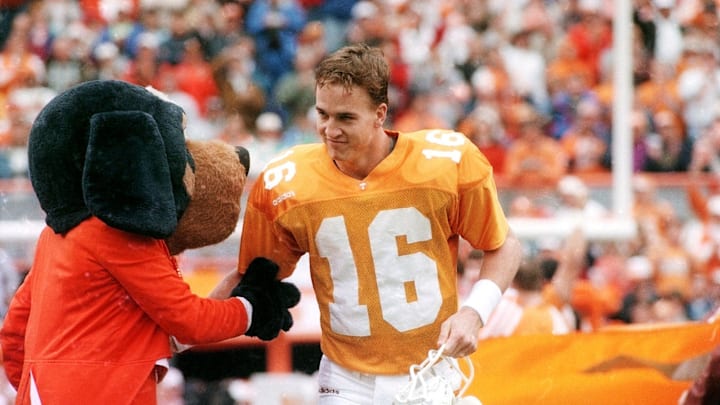 Rather than go to the NFL, where he may have been the No. 1 pick in 1996, Peyton Manning returned for his senior year in ‘97.