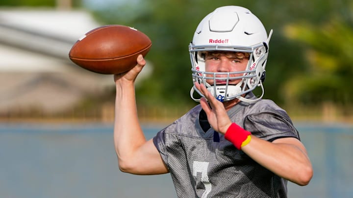Aug. 9, 2022; Phoenix, Ariz., U.S.; Sophomore quarterback Luke Haugo (7) throws the ball during practice at North High School in Phoenix