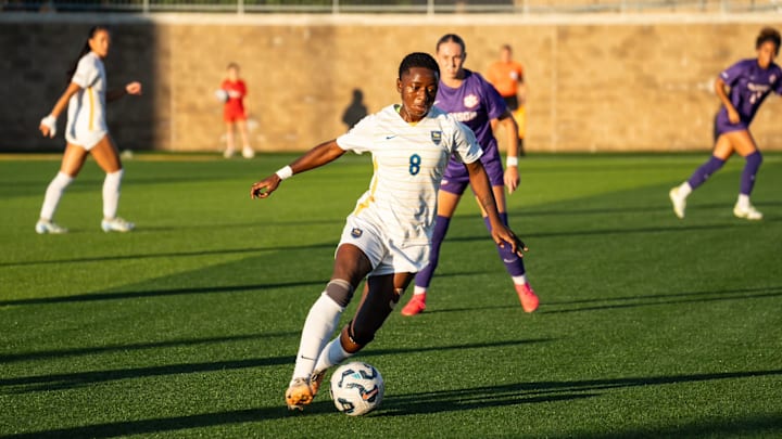 Pitt Women's Soccer midfielder Deborah Abiodun dribbles in the 4-1 win over Clemson