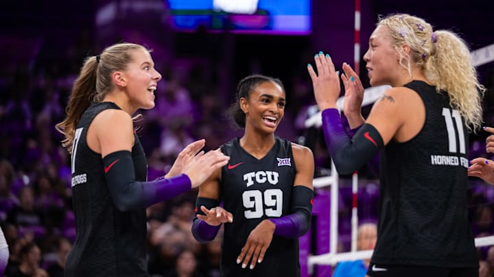 TCU's Becca Kelley, Evan Hendrix, and Rosemary Archer celebrate a point in the win over Kansas. TCU's Becca Kelley, Evan Hendrix, and Rosemary Archer celebrate a point in the win over Kansas.