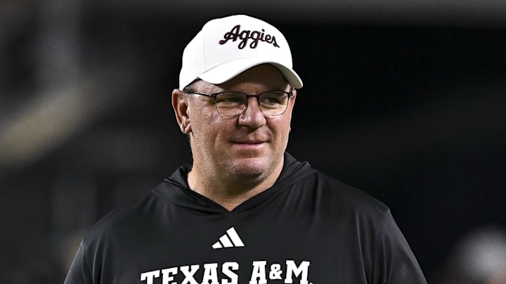 Texas A&M Aggies head coach Mike Elko walks on the field prior to the game against the New Mexico State Aggies at Kyle Field. 
