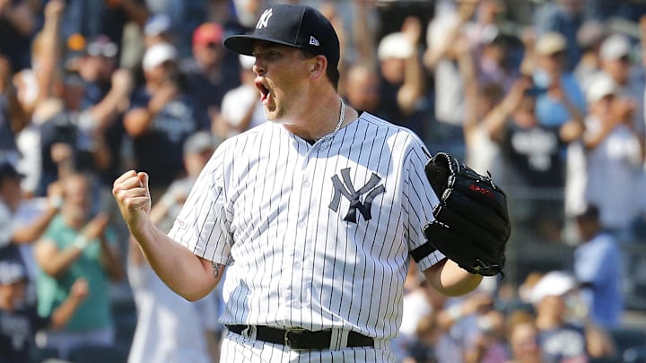 Aug 3, 2019; Bronx, NY, USA; New York Yankees relief pitcher Jonathan Holder (56) reacts after