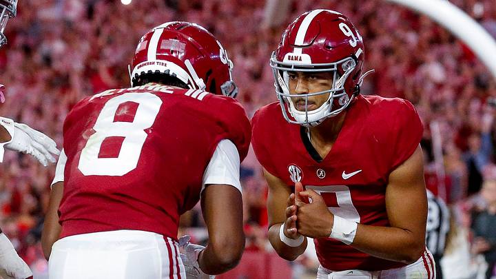 Oct 23, 2021; Tuscaloosa, Alabama, USA; Alabama Crimson Tide wide receiver John Metchie III (8) and quarterback Bryce Young (9) celebrate after a touchdown against the Tennessee Volunteers during the first half at Bryant-Denny Stadium. Mandatory Credit: Gary Cosby Jr.-USA TODAY Sports Oct 23, 2021; Tuscaloosa, Alabama, USA; Alabama Crimson Tide wide receiver John Metchie III (8) and quarterback Bryce Young (9) celebrate after a touchdown against the Tennessee Volunteers during the first half at Bryant-Denny Stadium. Mandatory Credit: Gary Cosby Jr.-USA TODAY Sports