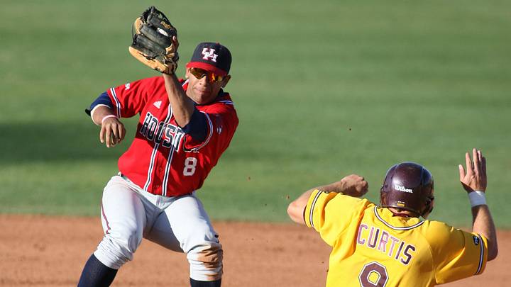 Feb 19, 2006; Tempe, AZ, USA; Arizona State Sun Devils right fielder (9) Colin Curtis steals second base as the Houston Cougars infielder (8) Dustin Kingsbury tries to put the tag down at Packard Stadium. Mandatory Credit: Rick Scuteri-Imagn Images Copyright Rick Scuteri Feb 19, 2006; Tempe, AZ, USA; Arizona State Sun Devils right fielder (9) Colin Curtis steals second base as the Houston Cougars infielder (8) Dustin Kingsbury tries to put the tag down at Packard Stadium. Mandatory Credit: Rick Scuteri-Imagn Images Copyright Rick Scuteri