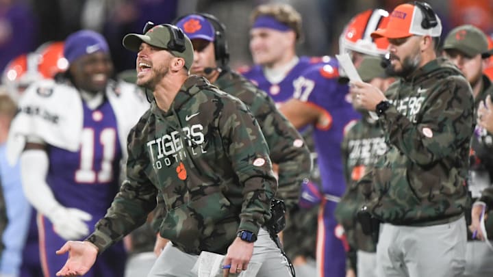 Nov 23, 2024; Clemson, South Carolina, USA; Clemson Tigers wide receiver coach Tyler Grisham communicates during a game against The Citadel Bulldogs at Memorial Stadium. 