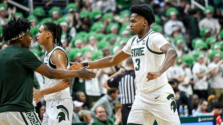 Michigan State's Cam Ward, right, celebrates his dunk with Trey Fort during a timeout in the first half in the game against Rutgers on Thursday, March 5, 2026, at the Breslin Center in East Lansing. Michigan State's Cam Ward, right, celebrates his dunk with Trey Fort during a timeout in the first half in the game against Rutgers on Thursday, March 5, 2026, at the Breslin Center in East Lansing.