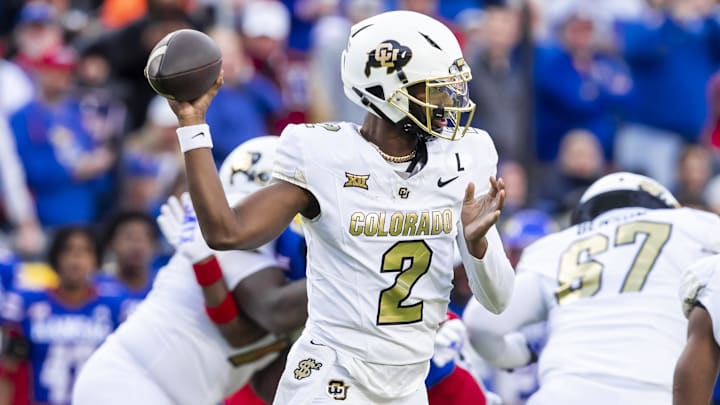 Nov 23, 2024; Kansas City, Missouri, USA;  Colorado quarterback Shedeur Sanders (2) passes the ball during the 2nd quarter between the Kansas Jayhawks and the Colorado Buffaloes at GEHA Field at Arrowhead Stadium. 