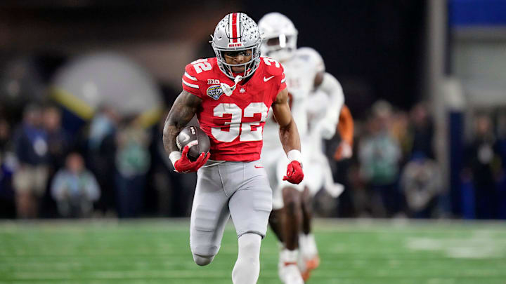 Ohio State Buckeyes running back TreVeyon Henderson (32) scores a touchdown on a 75-yard touchdown catch and run against Texas Longhorns in the second quarter of the Cotton Bowl Classic during the College Football Playoff semifinal game at AT&T Stadium in Arlington, Texas on January, 10, 2025.