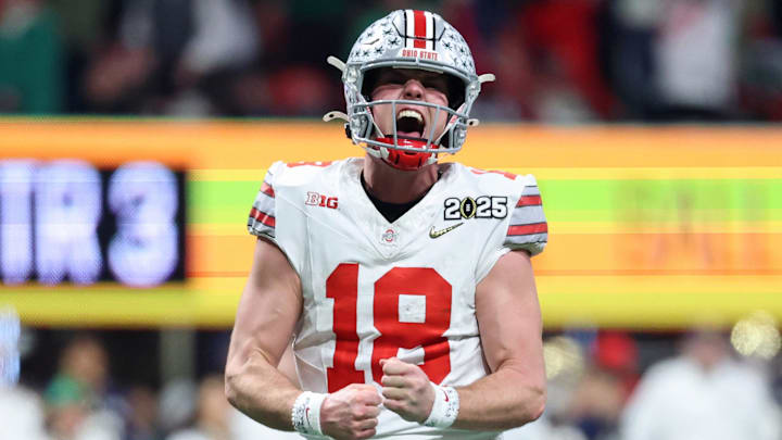 Jan 20, 2025; Atlanta, GA, USA; Ohio State Buckeyes quarterback Will Howard (18) reacts after a play against the Notre Dame Fighting Irish during the second half the CFP National Championship college football game at Mercedes-Benz Stadium. Mandatory Credit: Mark J. Rebilas-Imagn Images Jan 20, 2025; Atlanta, GA, USA; Ohio State Buckeyes quarterback Will Howard (18) reacts after a play against the Notre Dame Fighting Irish during the second half the CFP National Championship college football game at Mercedes-Benz Stadium. Mandatory Credit: Mark J. Rebilas-Imagn Images