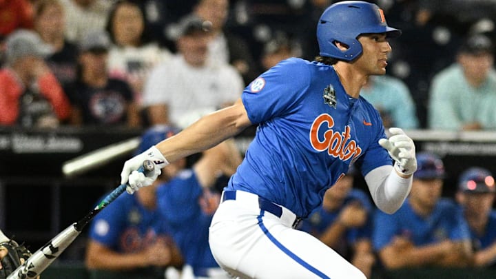 Florida Gators first baseman Jac Caglianone (14) singles in the Texas A&M Aggies during the eighth inning at Charles Schwab Field in Omaha, Neb., one June 19, 2024. Florida Gators first baseman Jac Caglianone (14) singles in the Texas A&M Aggies during the eighth inning at Charles Schwab Field in Omaha, Neb., one June 19, 2024.