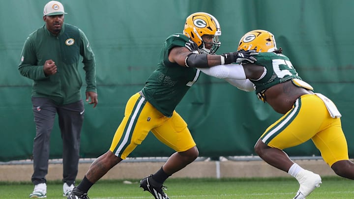 Green Bay Packers defensive ends Micah Parsons (1) and Brenton Cox Jr. (57) run through a drill during practice on Wednesday, September 3, 2025, at Clarke Hinkle Field in Ashwaubenon, Wis. 
Tork Mason/USA TODAY NETWORK-Wisconsin
