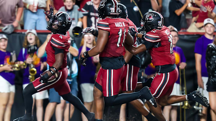 Sep 6, 2025; Columbia, South Carolina, USA; South Carolina Gamecocks defensive back Vicari Swain (4) celebrates his second punt return touchdown against the South Carolina State Bulldogs in the second quarter at Williams-Brice Stadium. Mandatory Credit: Jeff Blake-Imagn Images