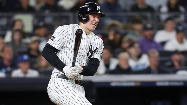 Oct 7, 2026; Bronx, New York, USA; New York Yankees designated hitter Ben Rice (22) hits a RBI single during the third inning against the Tampa Bay Rays in game three of the ALDS for the 2026 MLB Playoffs at Yankee Stadium. Mandatory Credit: Wendell Cruz-Imagn Images Oct 7, 2026; Bronx, New York, USA; New York Yankees designated hitter Ben Rice (22) hits a RBI single during the third inning against the Tampa Bay Rays in game three of the ALDS for the 2026 MLB Playoffs at Yankee Stadium. Mandatory Credit: Wendell Cruz-Imagn Images
