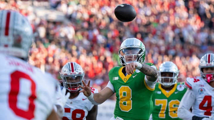 Oregon quarterback Dillon Gabriel throws a touchdown pass to wide receiver Traeshon Holden as the Oregon Ducks face the Ohio State Buckeyes Wednesday, Jan. 1, 2025, in the quarterfinal of the College Football Playoff at the Rose Bowl in Pasadena, Calif.