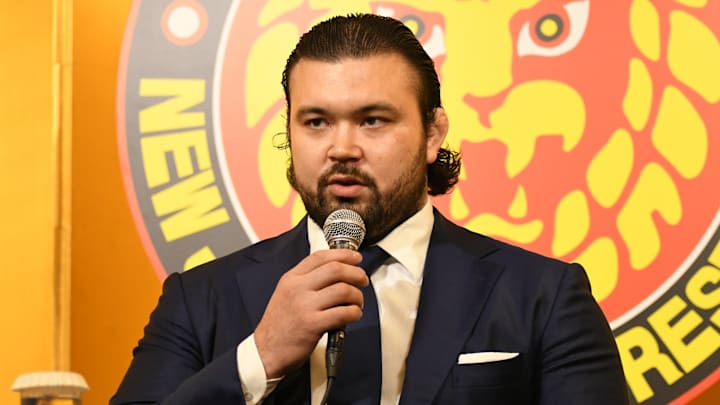 Olympic Gold Medalist Aaron Wolf addresses reporters at a press conference announcing his signing to New Japan Pro-Wrestling.