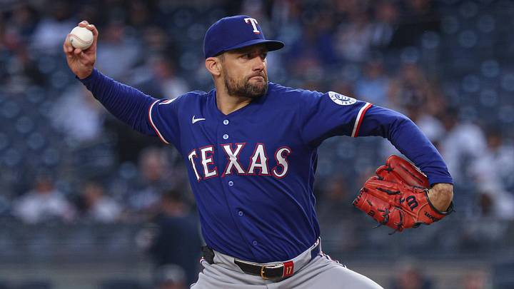 Texas Rangers pitcher Nathan Eovaldi throws a baseball.