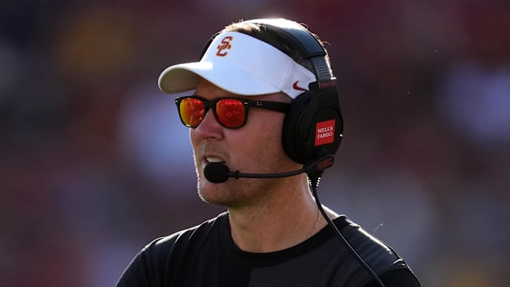 Aug 30, 2025; Los Angeles, California, USA; Southern California Trojans head coach Lincoln Riley watches from the sidelines against the Missouri State Bears in the first half at United Airlines Field at Los Angeles Memorial Coliseum. Mandatory Credit: Kirby Lee-Imagn Images