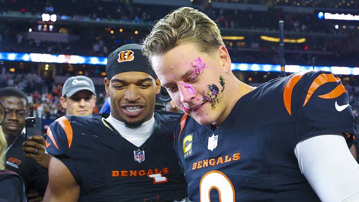 Dec 9, 2024; Arlington, Texas, USA; Cincinnati Bengals wide receiver Ja'Marr Chase (1) smashes a donut on the face of Cincinnati Bengals quarterback Joe Burrow (9) after the game against the Dallas Cowboys at AT&T Stadium. Mandatory Credit: Kevin Jairaj-Imagn Images Dec 9, 2024; Arlington, Texas, USA; Cincinnati Bengals wide receiver Ja'Marr Chase (1) smashes a donut on the face of Cincinnati Bengals quarterback Joe Burrow (9) after the game against the Dallas Cowboys at AT&T Stadium. Mandatory Credit: Kevin Jairaj-Imagn Images