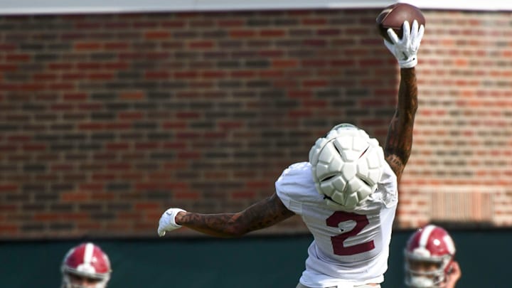 The Crimson Tide works out on the first day of practice for the 2024 season Wednesday, July 31, 2024. Alabama wide receiver Ryan Williams (2) makes a one-hand catch.