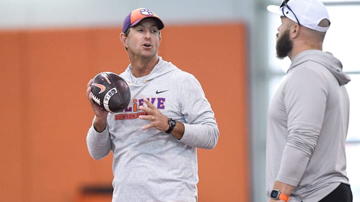 Clemson head coach Dabo Swinney talks with Clemson linebackers coach Ben Boulware during Spring Practice in Clemson, S.C. Monday, March 24, 2025.