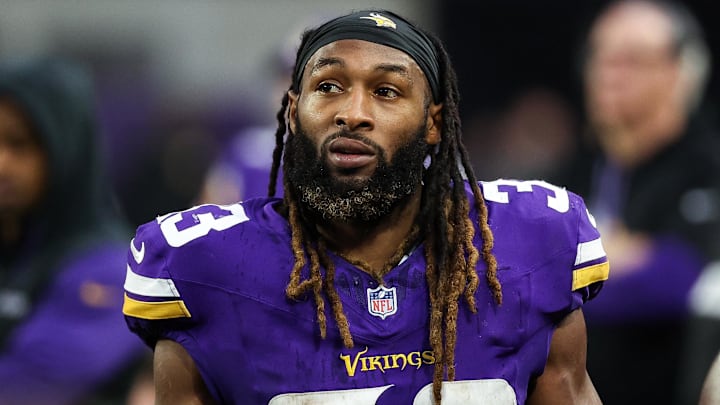 Dec 8, 2024; Minneapolis, Minnesota, USA; Minnesota Vikings running back Aaron Jones (33) looks on during the fourth quarter against the Atlanta Falcons at U.S. Bank Stadium.
