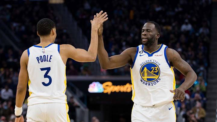 Jan 22, 2023; San Francisco, California, USA; Golden State Warriors guard Jordan Poole (3) and forward Draymond Green (23) celebrate after Poole drew a foul against the Brooklyn Nets during the first half at Chase Center. Mandatory Credit: John Hefti-Imagn Images