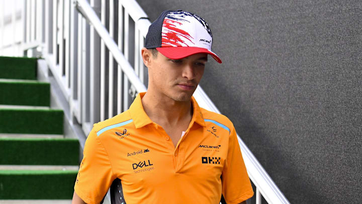Oct 18, 2024; Austin, Texas, USA; McLaren Formula 1 Team driver Lando Norris (4) of Team Great Britain walks through the paddock area before practice for the 2024 US Grand Prix at Circuit of the Americas. Mandatory Credit: Jerome Miron-Imagn Images