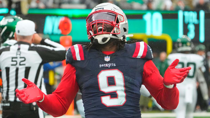  Sep 24, 2023; East Rutherford, New Jersey, USA; New York Jets quarterback Zach Wilson (2) is sacked for a safety by New England Patriots linebacker Matthew Judon (9) in the 4th quarter at MetLife Stadium. Mandatory Credit: Robert Deutsch-USA TODAY Sports