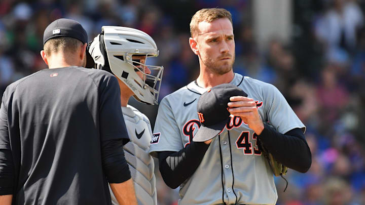 Aug 22, 2024; Chicago, Illinois, USA; Detroit Tigers relief pitcher Joey Wentz (right) reacts next to catcher Dillon Dingler (center) after giving up a two-run double to Chicago Cubs center fielder Pete Crow-Armstrong (not pictured) during the seventh inning at Wrigley Field. Mandatory Credit: Patrick Gorski-Imagn Images