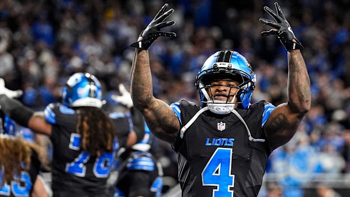 Detroit Lions cornerback D.J. Reed (4) celebrates a 34-27 win over the New York Giants in overtime at Ford Field in Detroit on Sunday, Nov. 23, 2025.