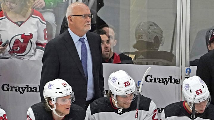 Nov 5, 2023; Chicago, Illinois, USA; New Jersey Devils head coach Lindy Ruff stands behind the bench