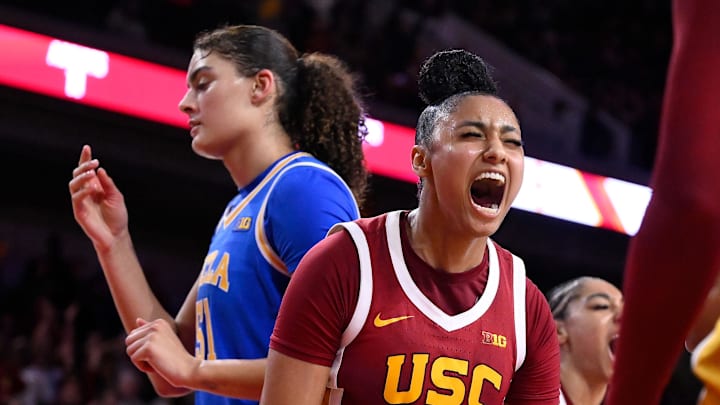 Feb 13, 2025; Los Angeles, California, USA; USC Trojans guard JuJu Watkins (12) lets out a yell after scoring in the fourth quarter against the UCLA Bruins at Galen Center. Mandatory Credit: Robert Hanashiro-Imagn Images