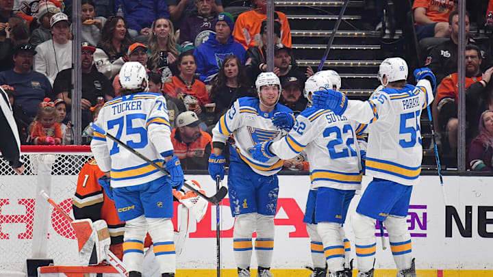 Apr 3, 2026; Anaheim, California, USA; St. Louis Blues celebrate the goal scored by center Pius Suter (22) against the Anaheim Ducks during the second period at Honda Center. Mandatory Credit: Gary A. Vasquez-Imagn Images