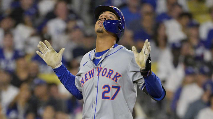 Oct 20, 2024; Los Angeles, California, USA; New York Mets third baseman Mark Vientos (27) celebrates after hitting a two run home run in the fourth inning against the Los Angeles Dodgers during game six of the NLCS for the 2024 MLB playoffs at Dodger Stadium. Mandatory Credit: Jayne Kamin-Oncea-Imagn Images
