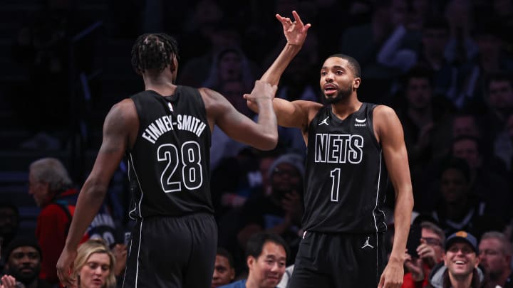 Jan 25, 2024; Brooklyn, New York, USA; Brooklyn Nets forward Mikal Bridges (1) celebrates after a basket with forward Dorian Finney-Smith (28) during the second half at Barclays Center. Mandatory Credit: Vincent Carchietta-USA TODAY Sports