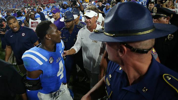 Sep 19, 2026; Oxford, Mississippi, USA; Mississippi Rebels linebacker Suntarine Perkins (4) speaks with Louisiana State Tigers head coach Lane Kiffin after the game at Vaught-Hemingway Stadium. Mandatory Credit: Petre Thomas-Imagn Images Sep 19, 2026; Oxford, Mississippi, USA; Mississippi Rebels linebacker Suntarine Perkins (4) speaks with Louisiana State Tigers head coach Lane Kiffin after the game at Vaught-Hemingway Stadium. Mandatory Credit: Petre Thomas-Imagn Images
