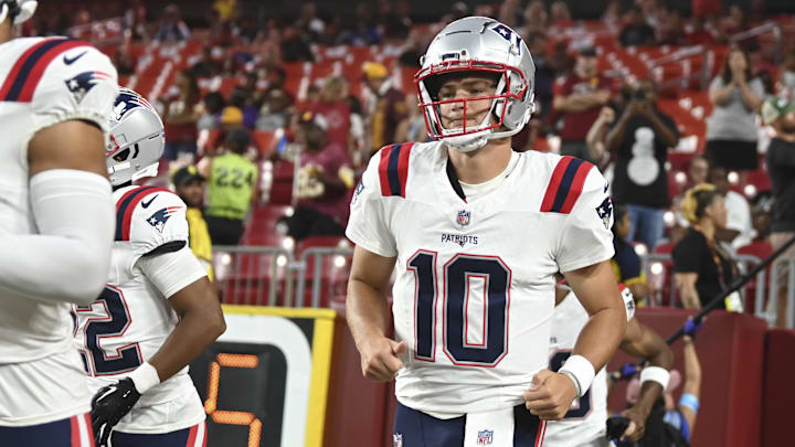 Aug 25, 2024; Landover, Maryland, USA;  New England Patriots quarterback Drake Maye (10) takes the field before the game against the Washington Commanders at Commanders Field. Mandatory Credit: Tommy Gilligan-Imagn Images