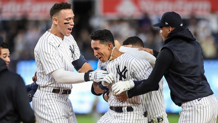 Sep 7, 2022; Bronx, New York, USA; New York Yankees right fielder Oswaldo Cabrera (95) celebrates with his teammates after hitting an RBI single to defeat the Minnesota Twins 5-4 in the twelfth inning at Yankee Stadium. Mandatory Credit: Wendell Cruz-USA TODAY Sports Sep 7, 2022; Bronx, New York, USA; New York Yankees right fielder Oswaldo Cabrera (95) celebrates with his teammates after hitting an RBI single to defeat the Minnesota Twins 5-4 in the twelfth inning at Yankee Stadium. Mandatory Credit: Wendell Cruz-USA TODAY Sports