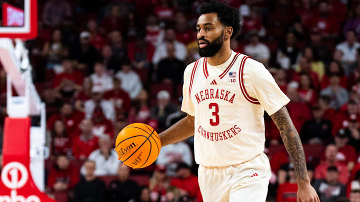  Brice Williams brings the ball up the court against the Iowa Hawkeyes during the first half at Pinnacle Bank Arena. 