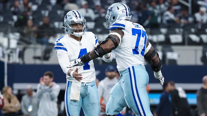 Dallas Cowboys quarterback Dak Prescott greets offensive tackle Tyron Smith before the game against the Philadelphia Eagles at AT&T Stadium. 
