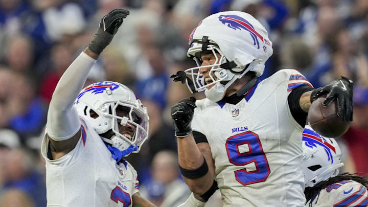 Nov 10, 2024; Indianapolis, Indiana, USA; Buffalo Bills safety Taylor Rapp (9) celebrates after making an interception Sunday, Nov. 10, 2024, during a game against the Indianapolis Colts at Lucas Oil Stadium in Indianapolis. 