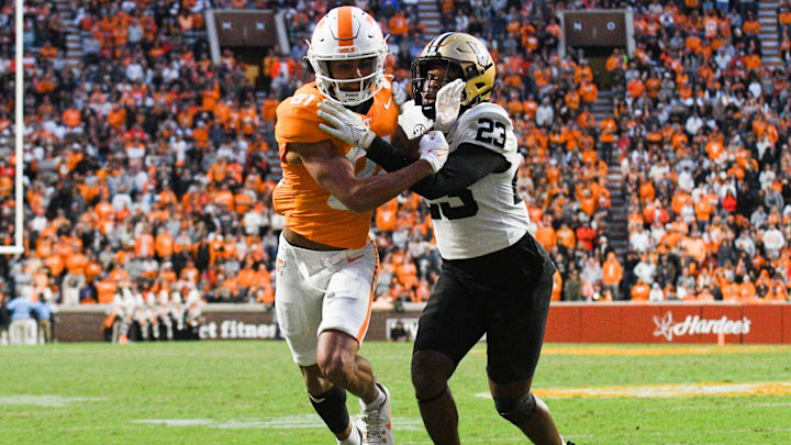 Tennessee wide receiver Chas Nimrod (81) and Vanderbilt defensive back Jaylen Mahoney (23) run into each other during the NCAA college football game against Vanderbilt on Saturday, November 25, 2023 in Knoxville, Tenn.