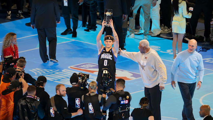 Osceola Magic guard Mac McClung (0) celebrates after winning the AT&T Slam Dunk Contest during NBA All-Star Saturday Night at Lucas Oil Stadium.
