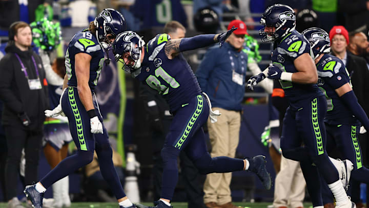 Jan 25, 2026; Seattle, WA, USA; Seattle Seahawks tight end Eric Saubert (81) celebrates after a play against the Los Angeles Rams during the second half in the 2026 NFC Championship Game at Lumen Field. Mandatory Credit: Kevin Ng-Imagn Images