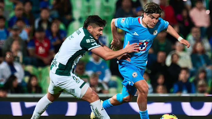 Liga BBVA MX Clausura 2025 Santos vs Cruz Azul Javier Guemez fights for the ball with Luka Romero