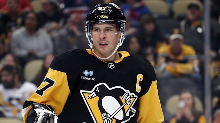Oct 9, 2024; Pittsburgh, Pennsylvania, USA;  Pittsburgh Penguins center Sidney Crosby (87) looks on against the New York Rangers during the third period at PPG Paints Arena. Mandatory Credit: Charles LeClaire-Imagn Images